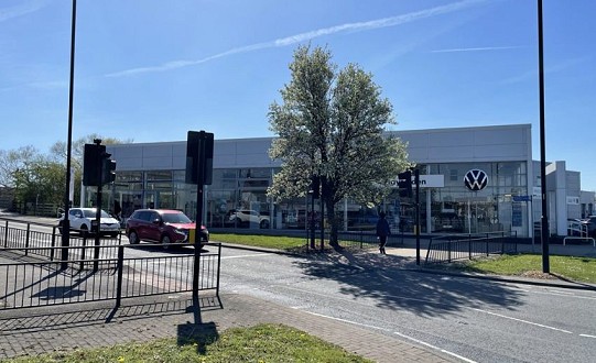 Former car dealership site changes hands