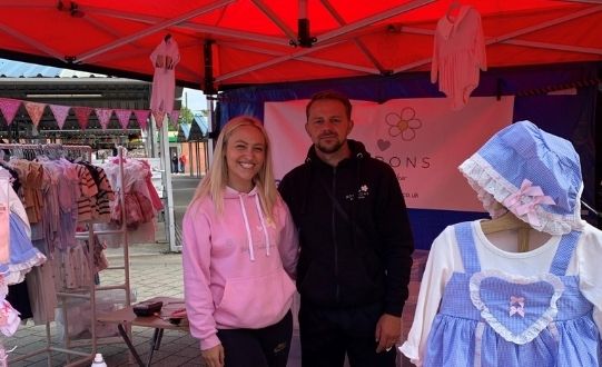 Jason and Sophie Stokes at market stall